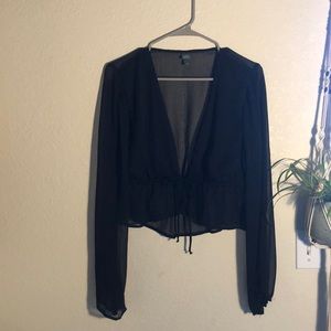 Sheer black top perfect for layering or going out!